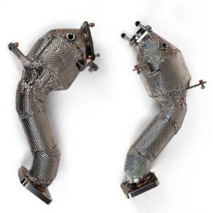 Two curved metallic automotive exhaust pipes with mounting brackets.